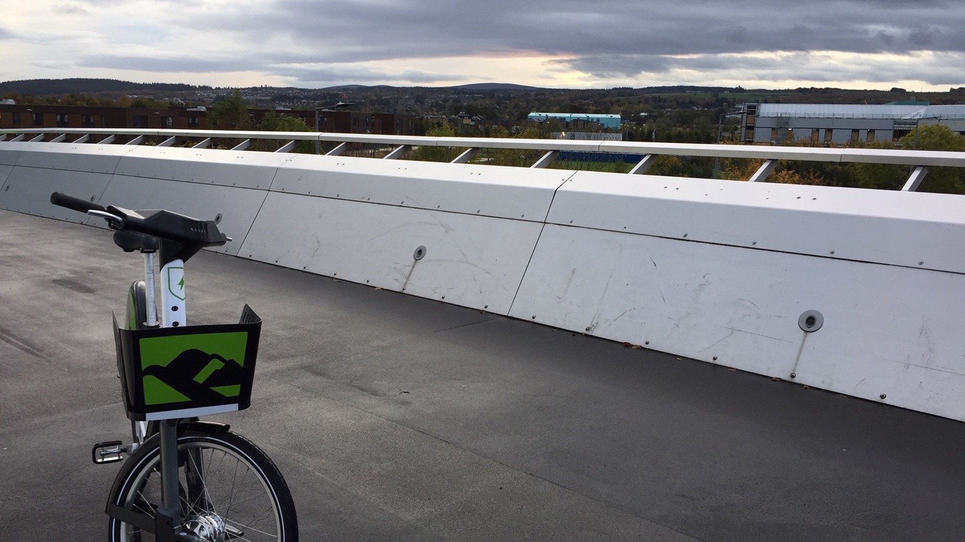 HiBike on the Inverness Campus golden bridge