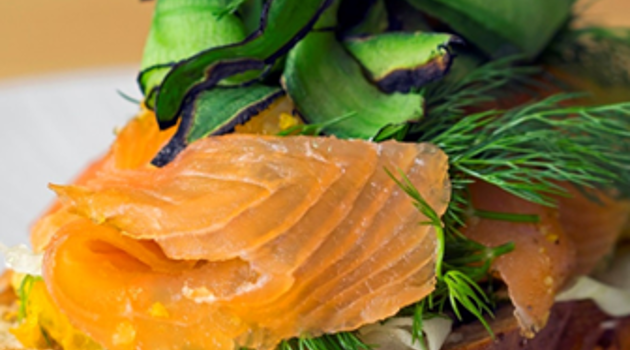 Smoked salmon on a bed of green salad