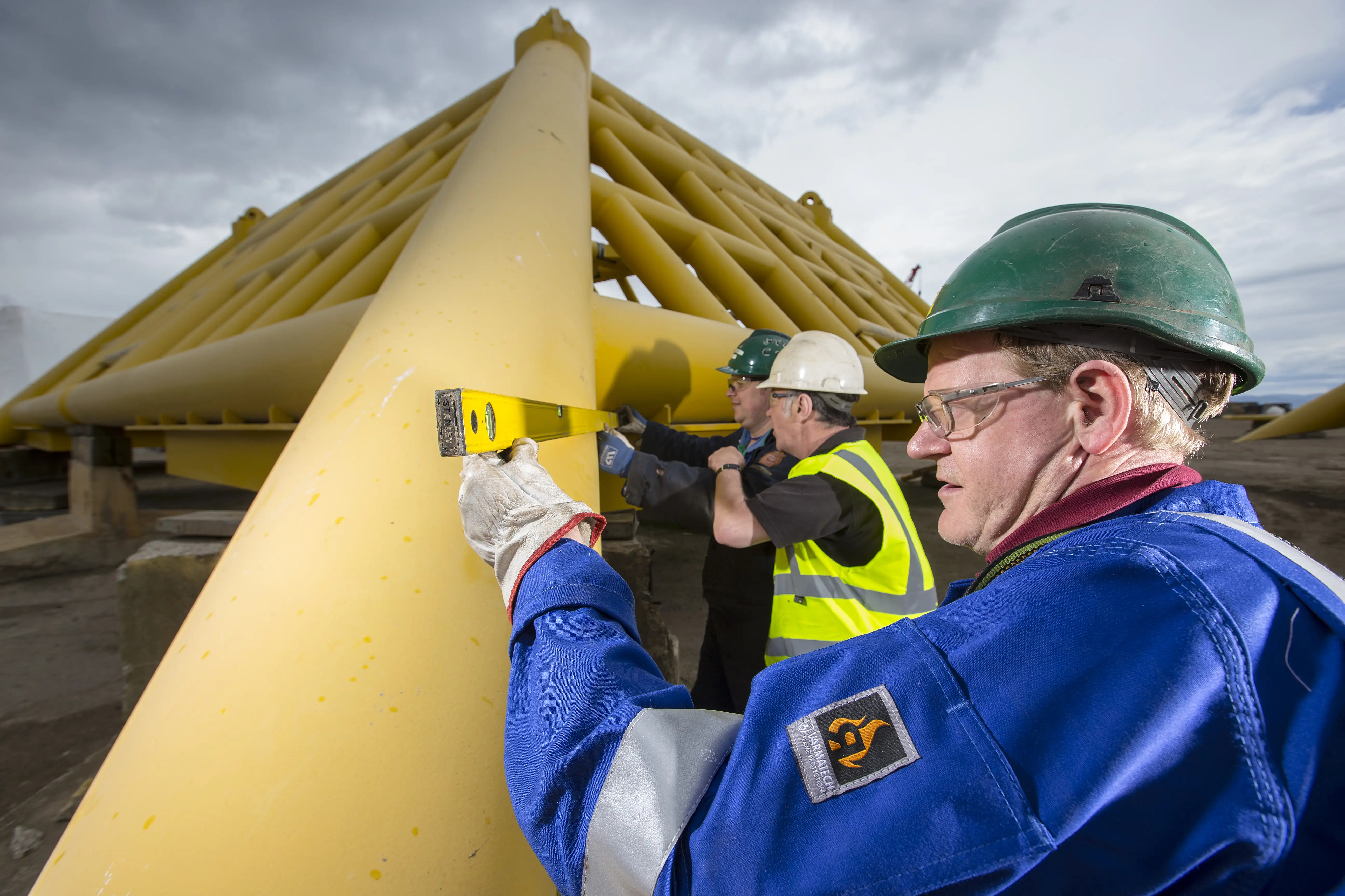 Engineer working on a docked oil rig at Nigg
