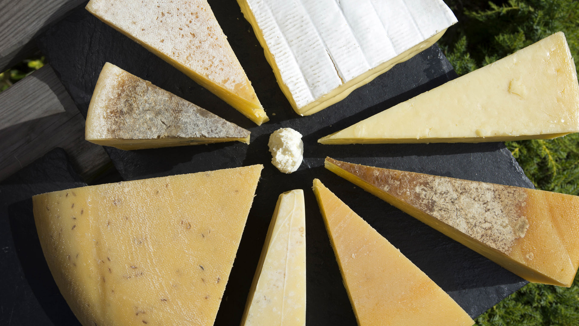 A cheese selection on a slate