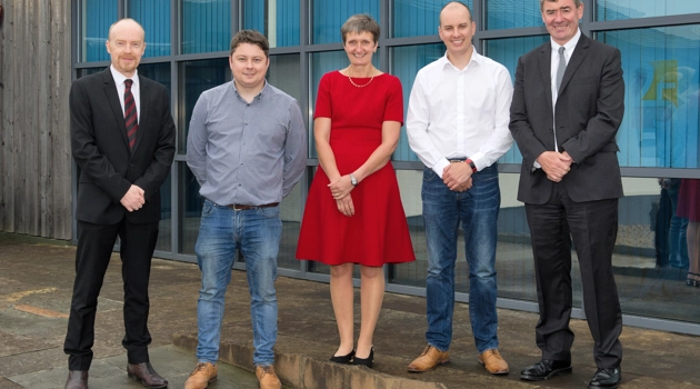 Group of people from the HIE board at Thurso Business park