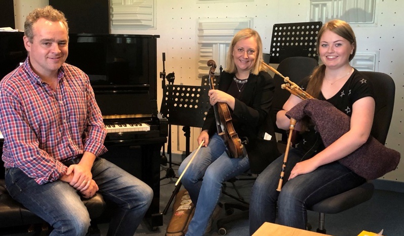 Group of student musicians from University of the Highlands and Islands with fiddle, piano and pipes