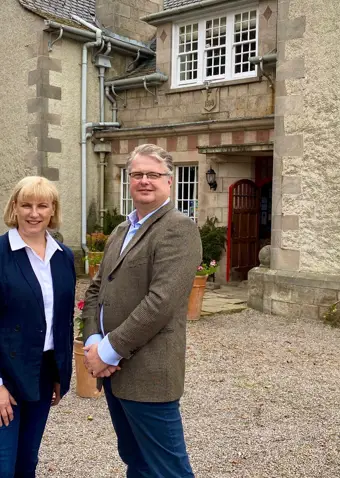 Gavin and Penny Ellis outside Knockomie Hotel by Forres