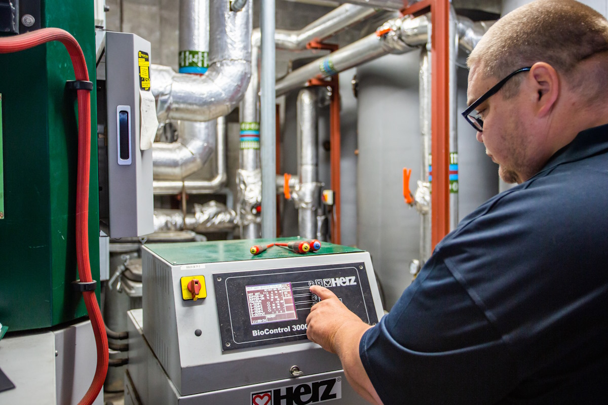 auchrannie worker at biomass equipment